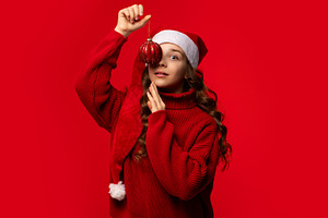 Girl in Santa hat, a Holiday Photo by Elena Vagengeim