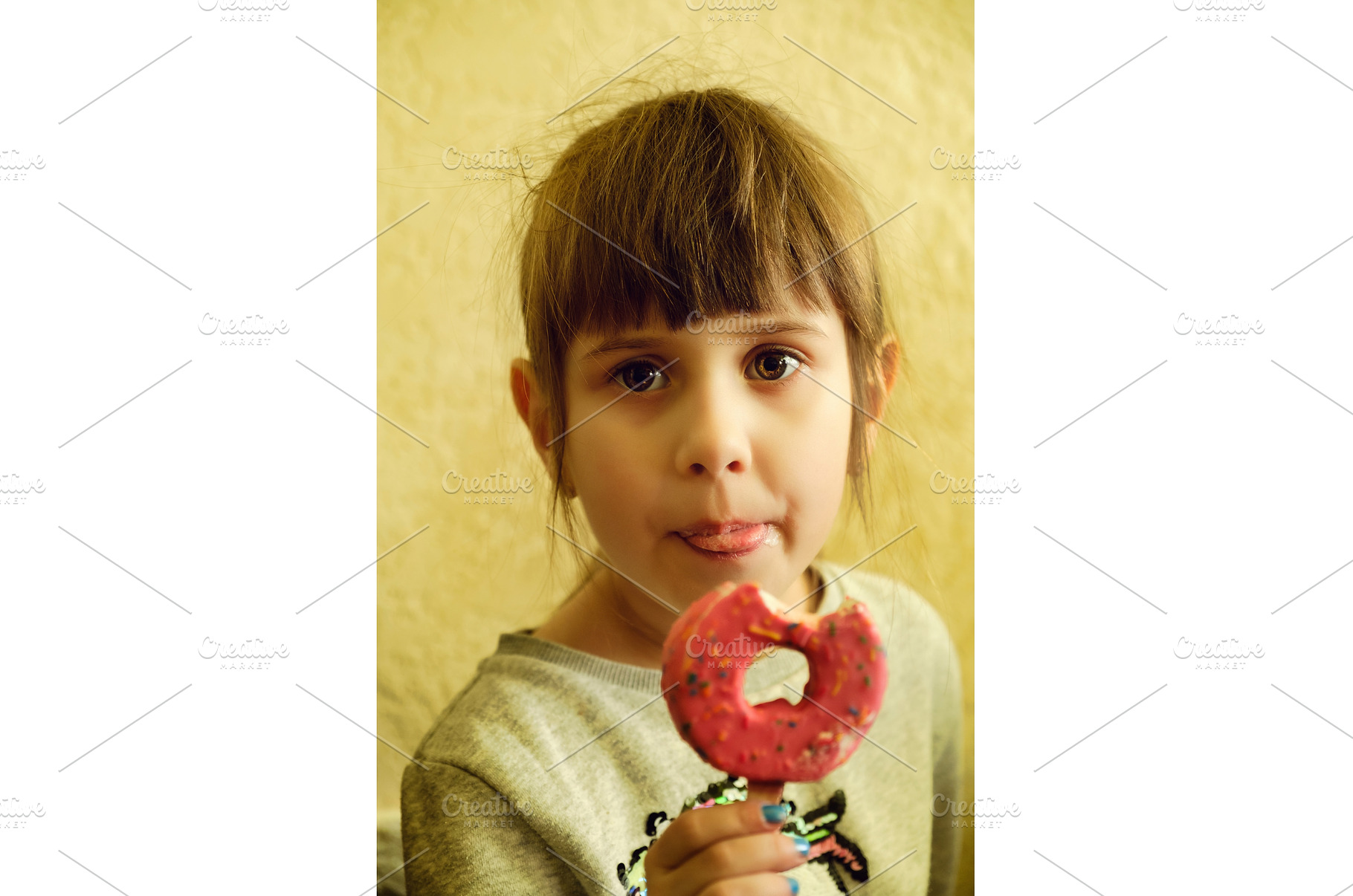 Portrait of a cute girl with a donut, a Food & Drink Photo by Rohan Photography