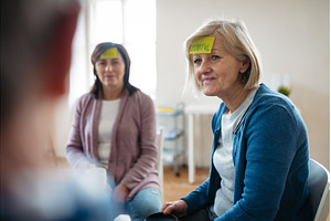Senior woman identifying emotions, a Business Photo by HalfPoint