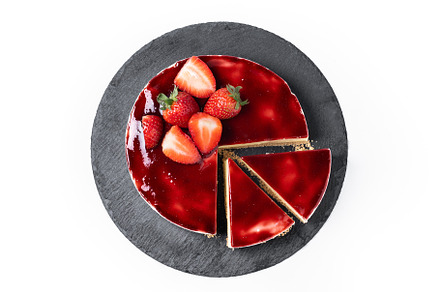Cheesecake with strawberries isolated on white background, a Food & Drink Photo by etorres69
