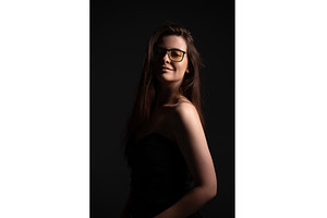 Young woman posing in a studio with, a Person Photo by volodymyrshtun13795