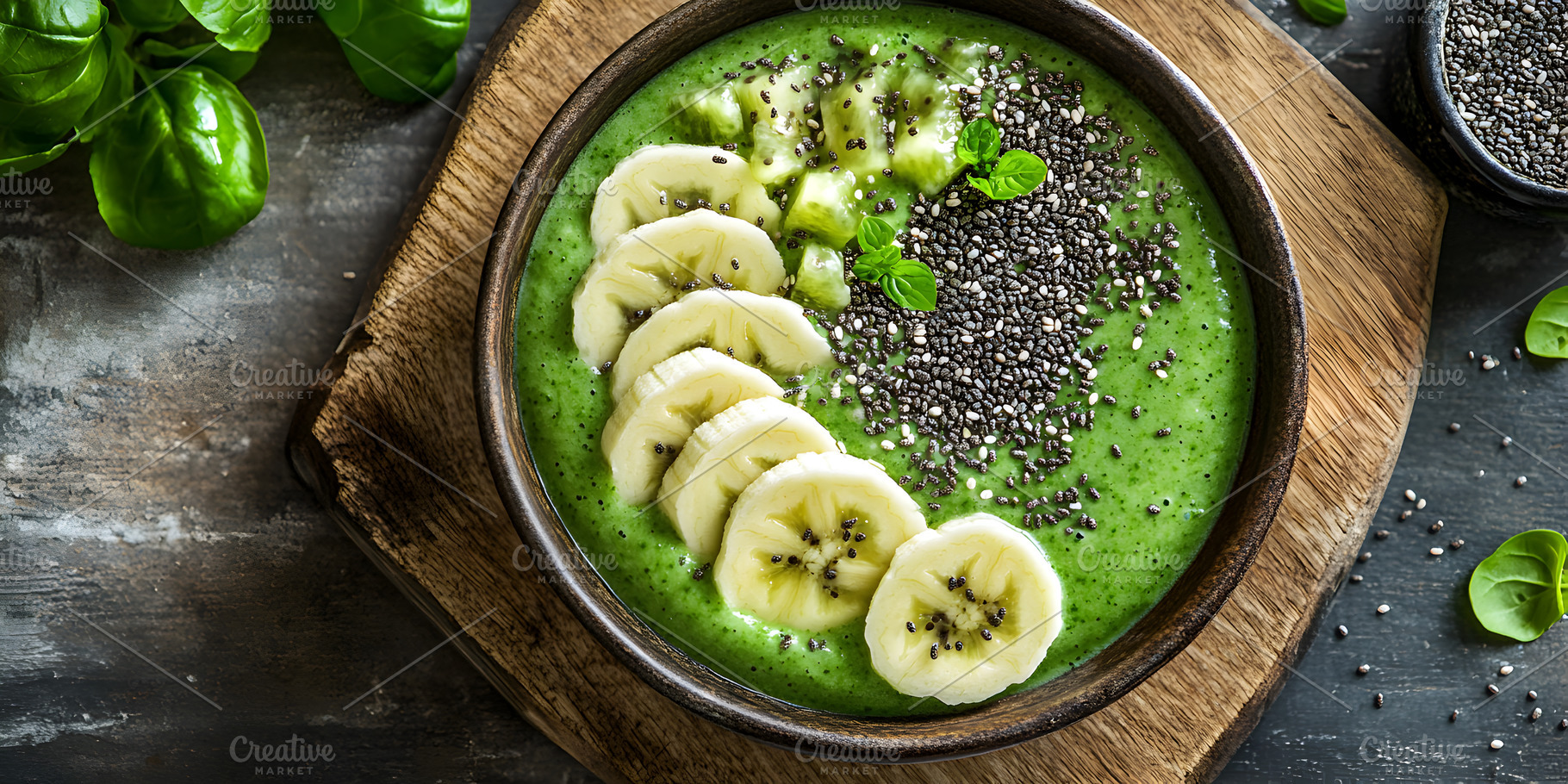 Green smoothie bowl with banana and, a Food & Drink Photo by Photostock