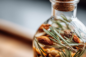Close up of a glass bottle filled, a Food & Drink Photo by MistyDay