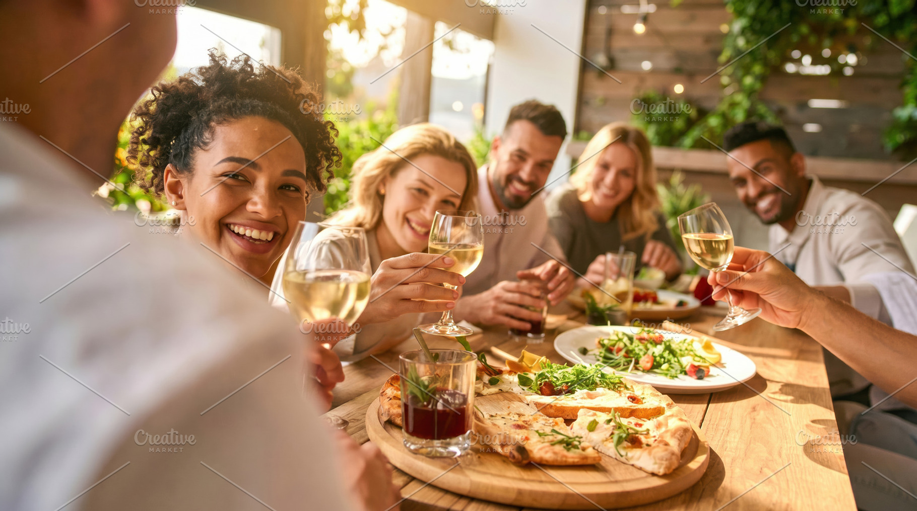 Friends Toasting with Wine at Outdoor Restaurant, a Photo by Davizro's Market