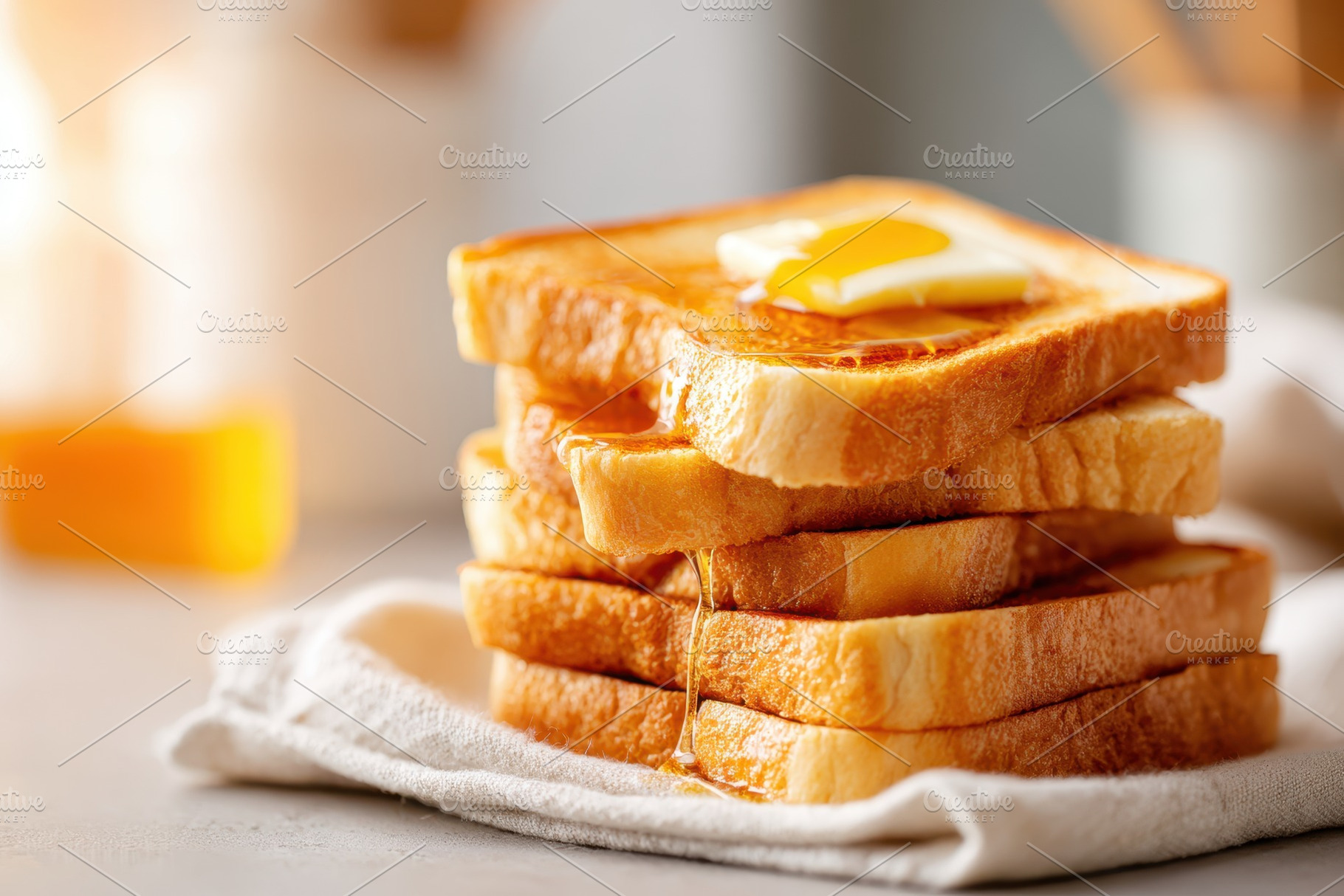 Stacked toast with butter and honey, a Food & Drink Photo by AlyaAnd