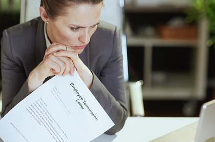 pensive modern female worker in modern green office, a Business Photo by Alliance Images