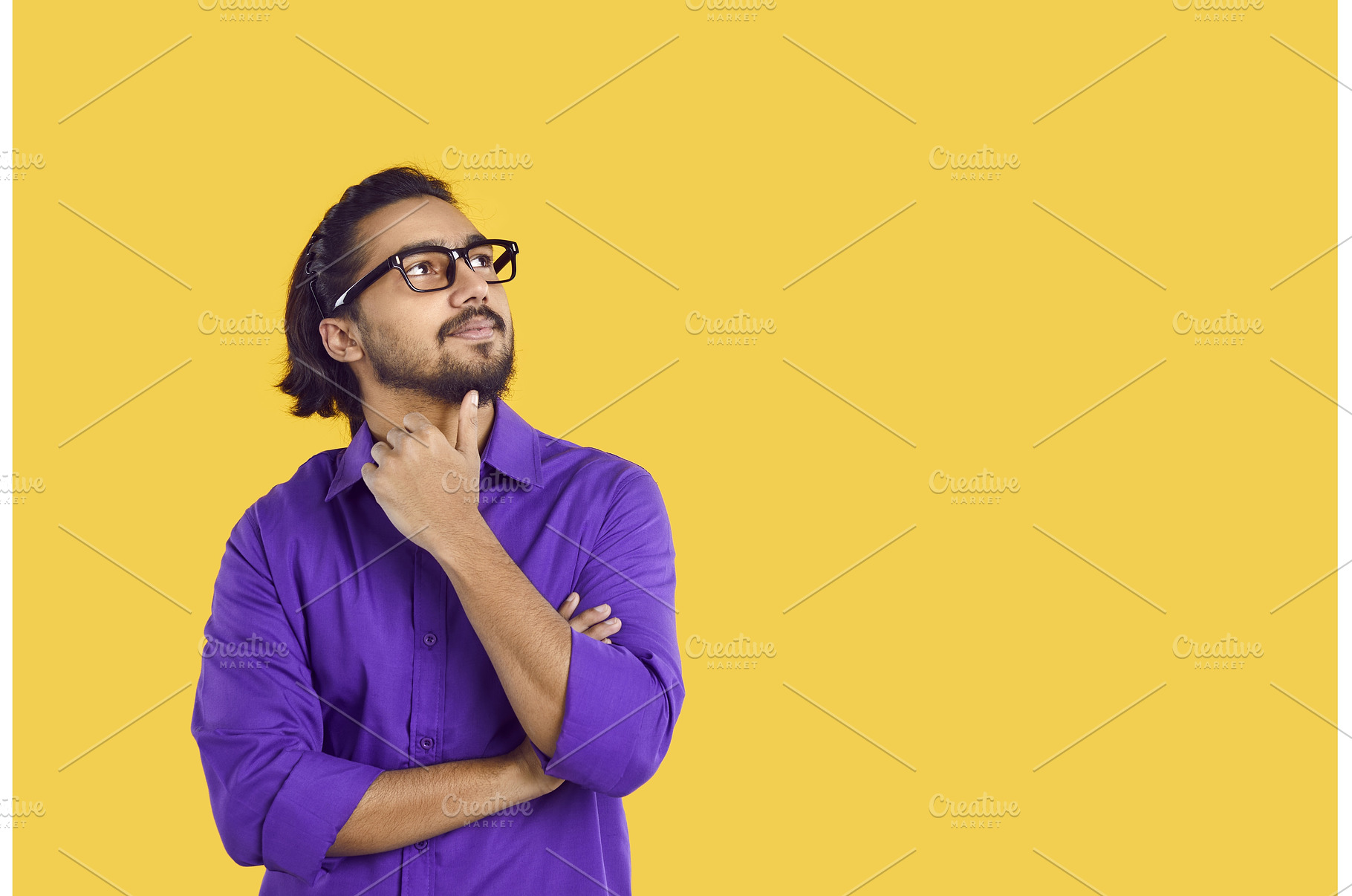 Thinkful indian man in glasses is, a Person Photo by StudioRomantic