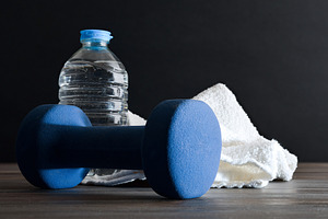 Sport training with dumbbells water and towel black isolated bac, a Sports & Recreation Photo by Davizro's Market