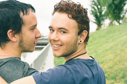 Gay couple stock photo containing adult and background