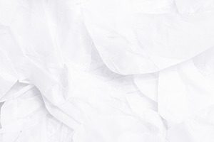 Paper Packaging filler, white wooden background, an Industrial Photo by MDBildes