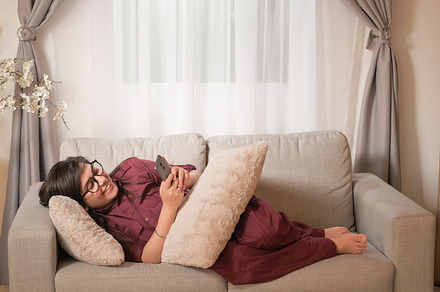 Phone entertainment home relax happy, a Person Photo by Photo Drive Studio