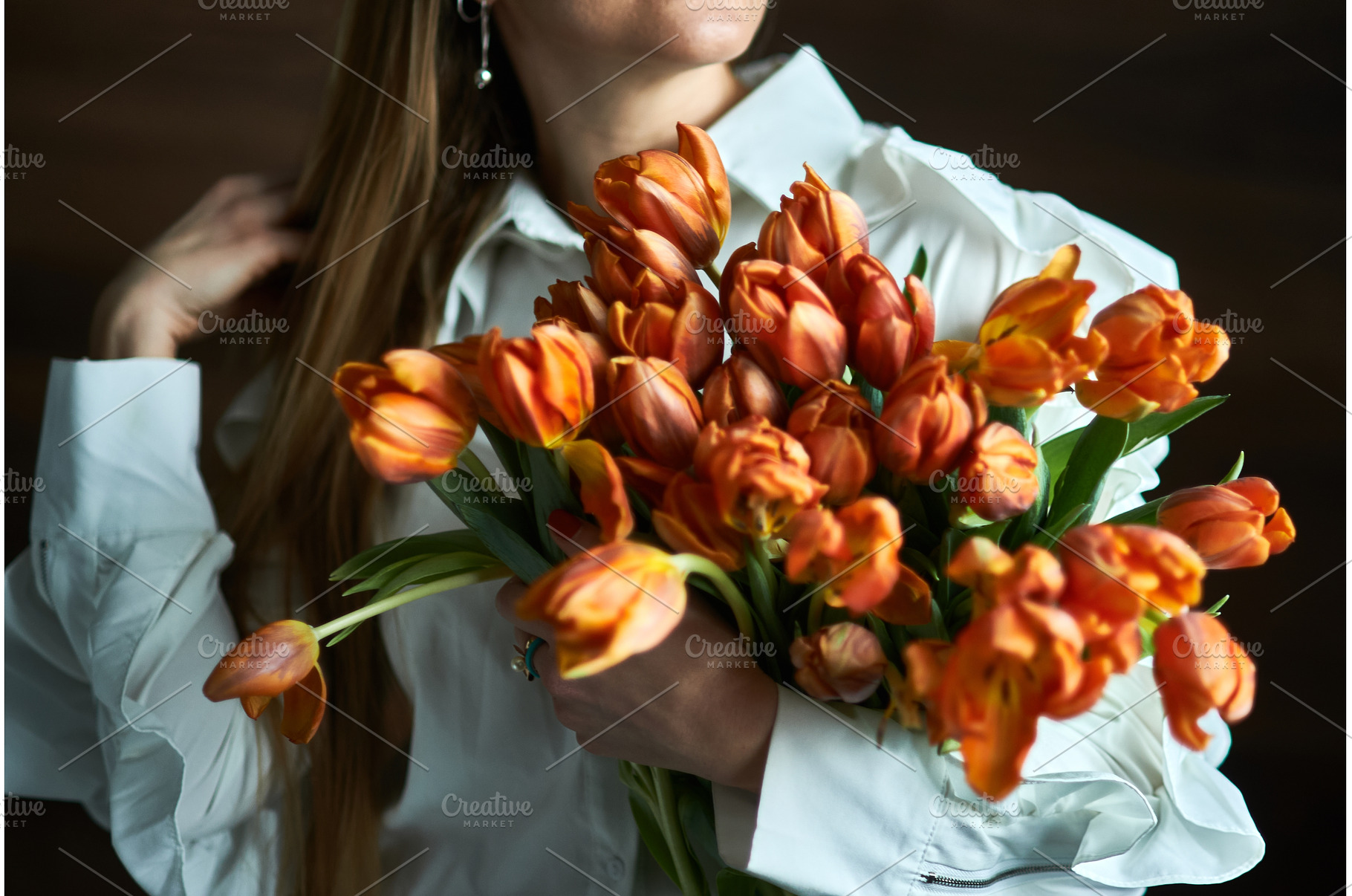 Woman holding vibrant bouquet of, a Nature Photo by wip3out