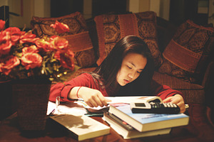 Studying on coffee table stock photo containing books and education