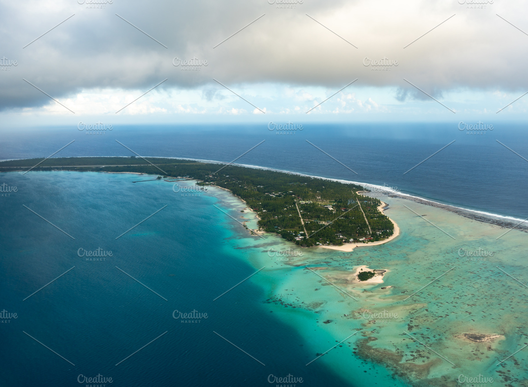 Aerial view of Rangiroa atoll, French Polynesia, with lagoon and, a Nature Photo by GoodGoods