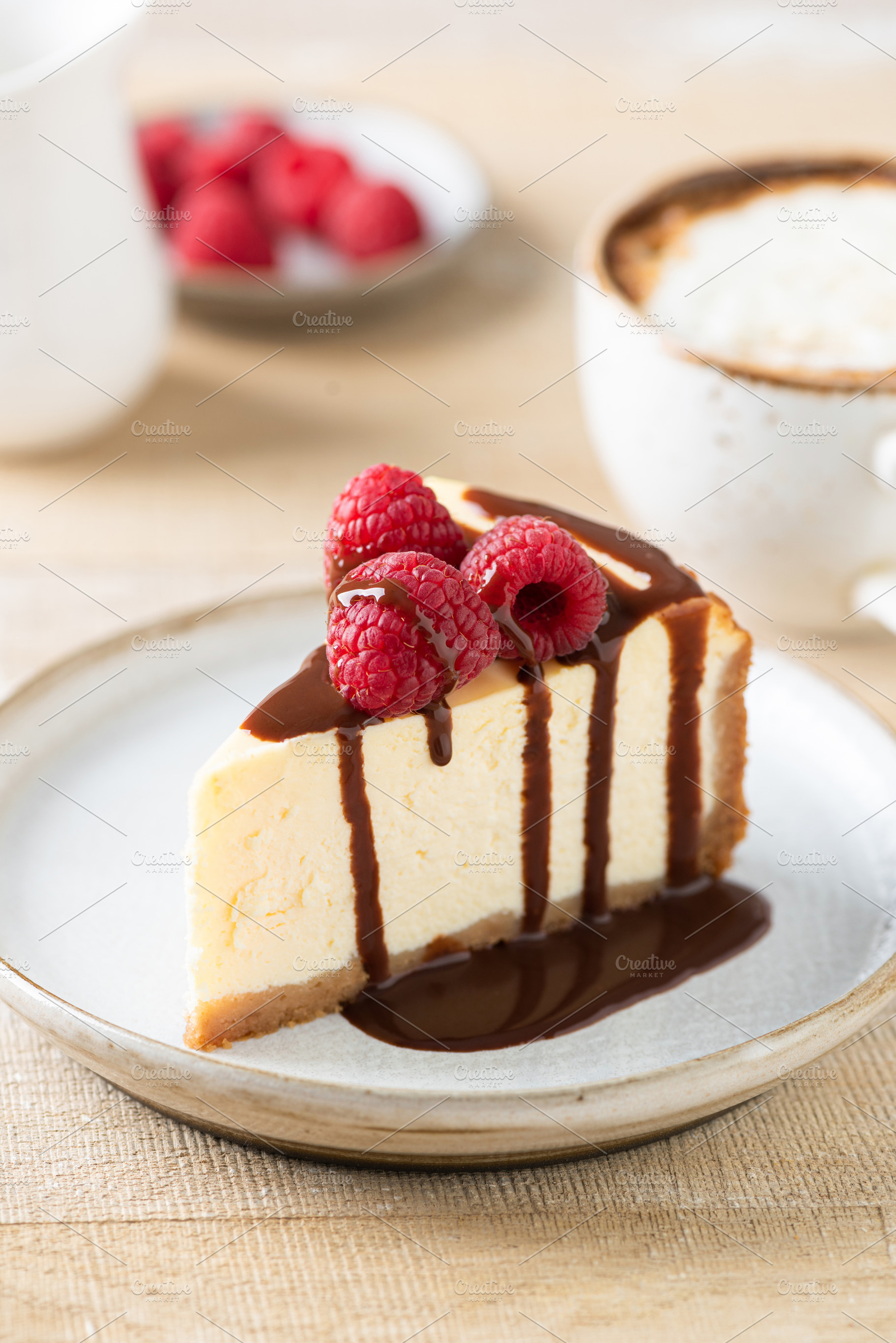 Slice of cheesecake with chocolate, a Food & Drink Photo by The baking man