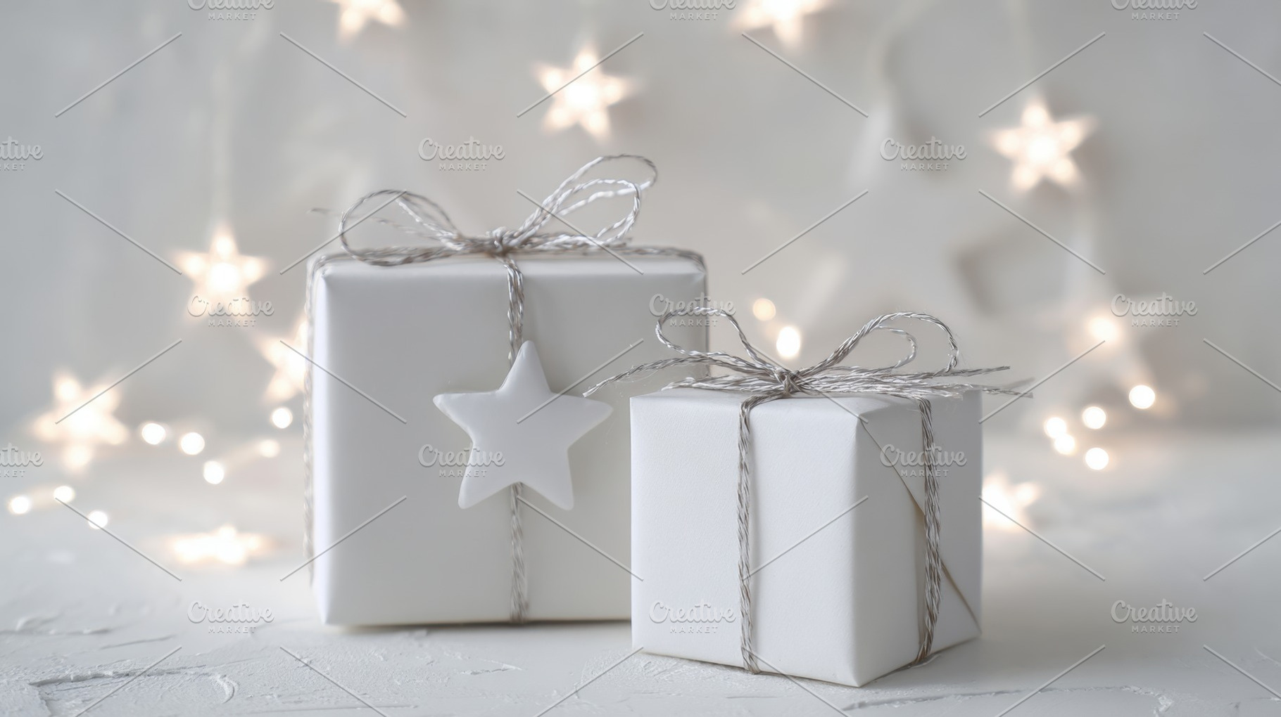Silver-tied white gifts, a Photo by Beautiful things