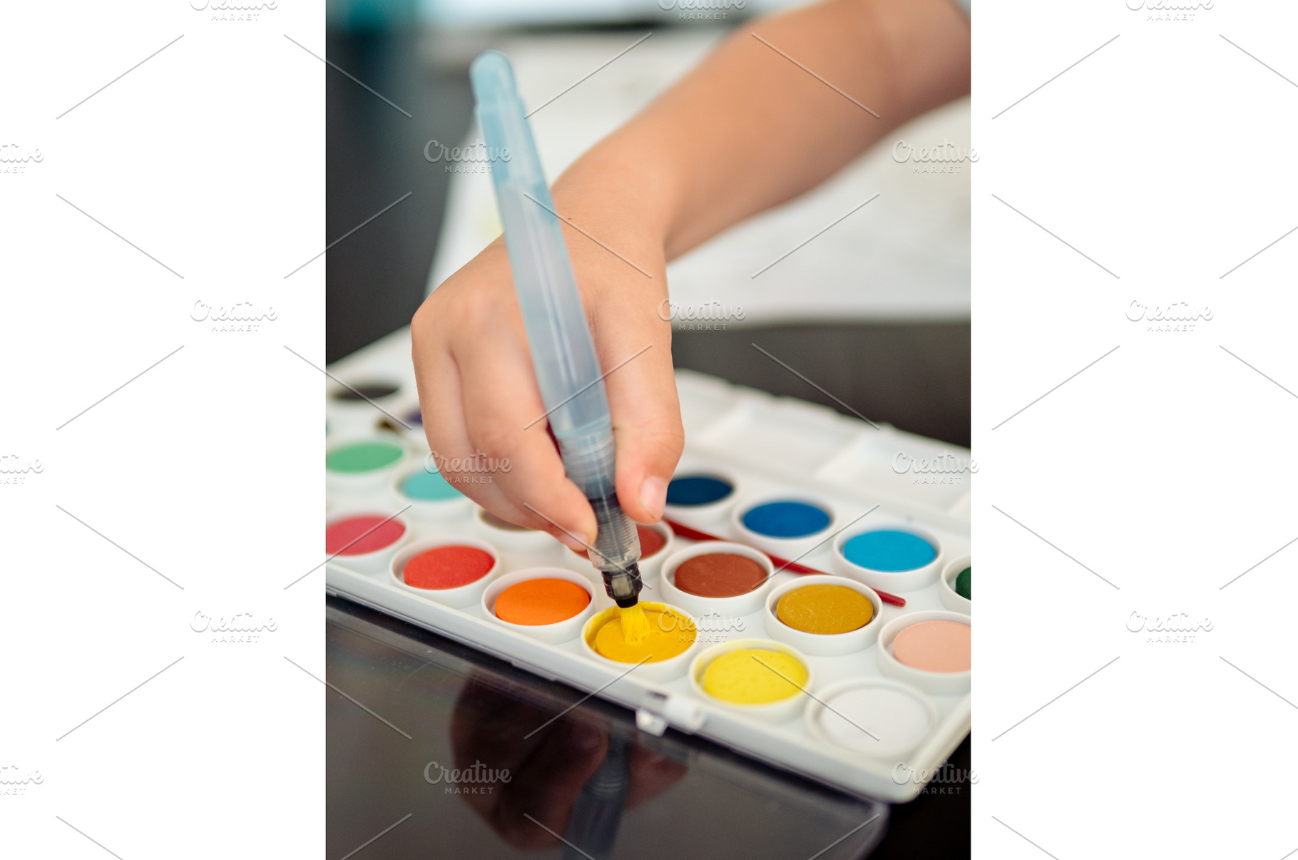 Boy draws with watercolors and, a School & Education Photo by Fascinadora