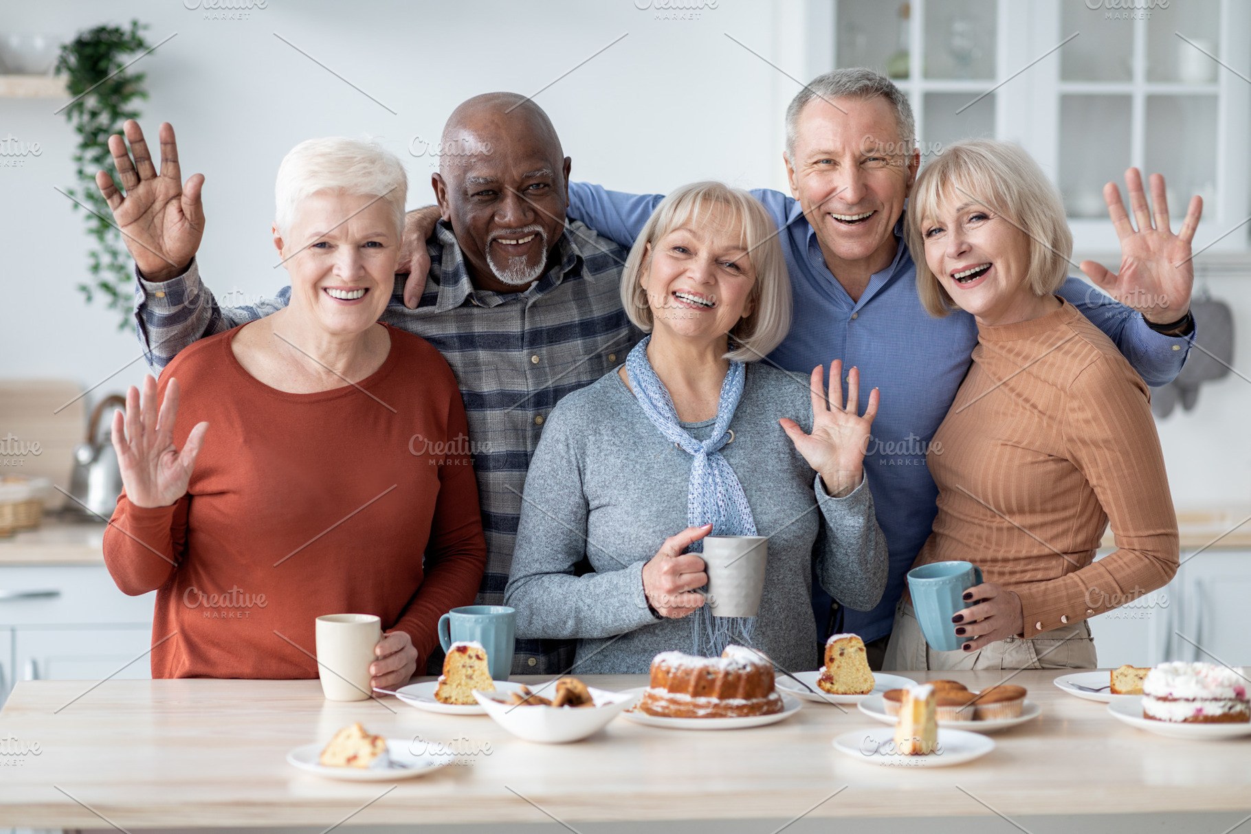 Portrait of cheerful elderly men and women spending time together, a Photo by Prostock-Studio