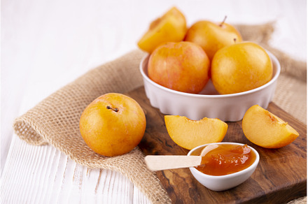 Close-up of plum jam in a white bowl