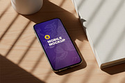 Mobile Mockup on Desk, a Product Mockup by OneVectorStock (Thumbnail 2 of 2)
