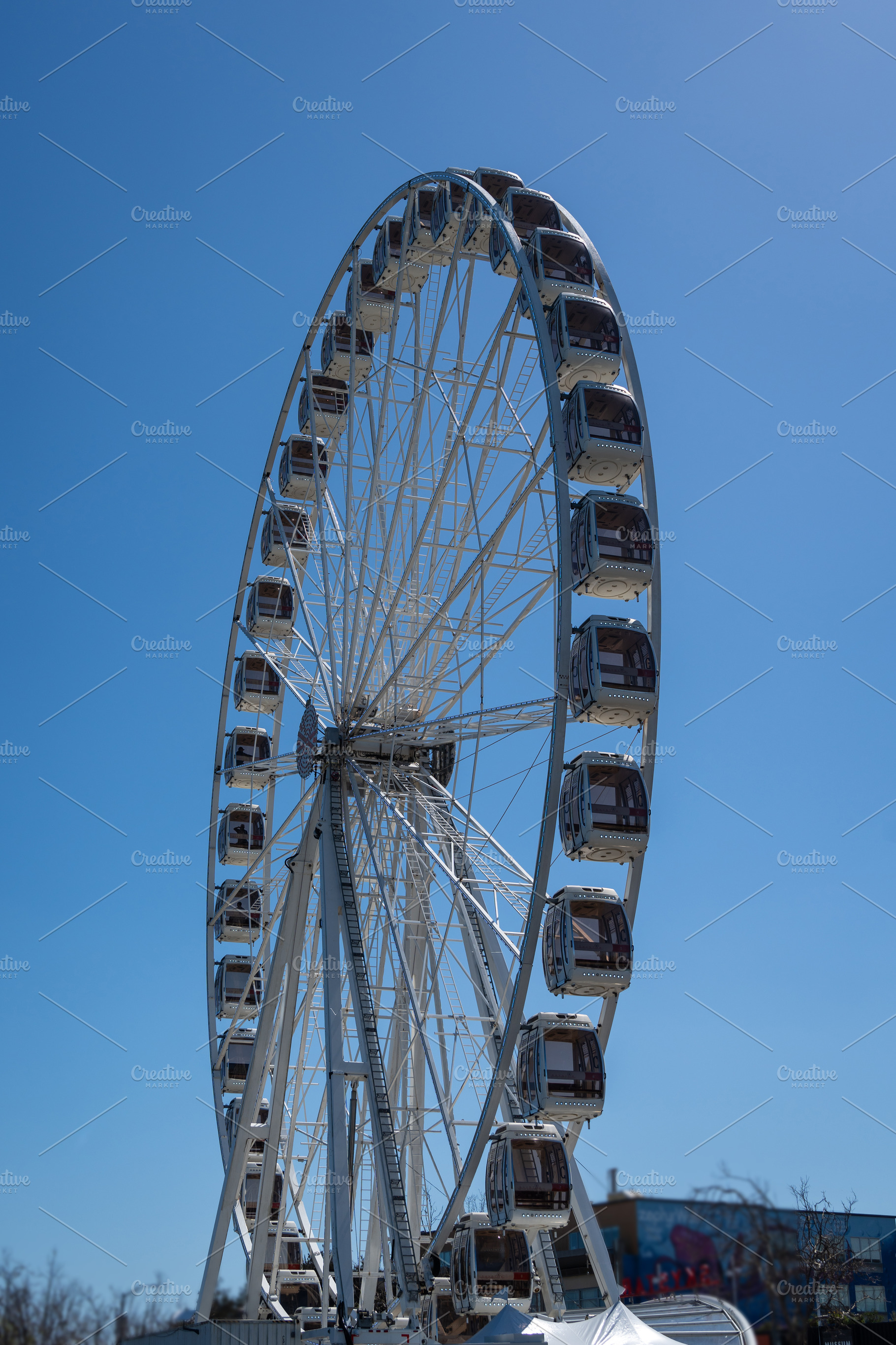Ferris wheel with enclosed cabins at Fisherman’s Wharf, San Fr, an Architecture Photo by GoodGoods