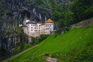 Magical Predjama Cave Castle, an Architecture Photo by Alpine Dreams