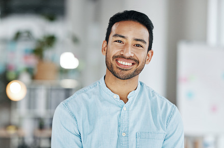 Happy, smile and portrait of man in office for executive, confident and positive. Development, corporate and growth with male employee standing in agency for management, expert and director, a Photo by Peopleimages.com