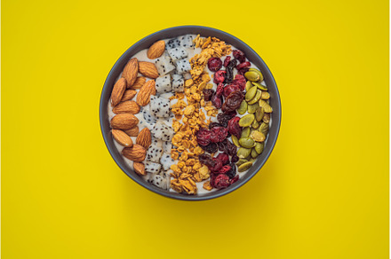 Mango smoothies bowl with almond, a Food & Drink Photo by Elizaveta Galitskaya