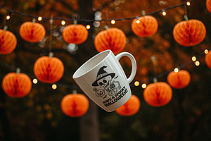 White Halloween Mug Mockup, a Cups & Container Mockup by Designer Dude