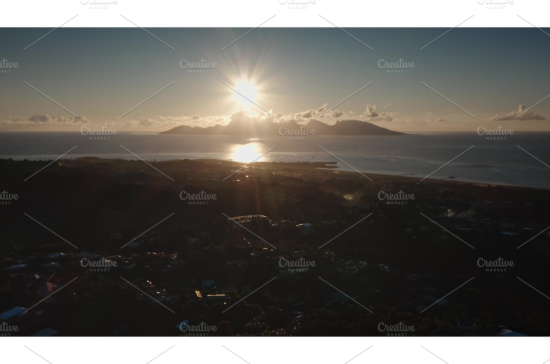 Sunrise illuminating Moorea island, a Nature Photo by Goinyk