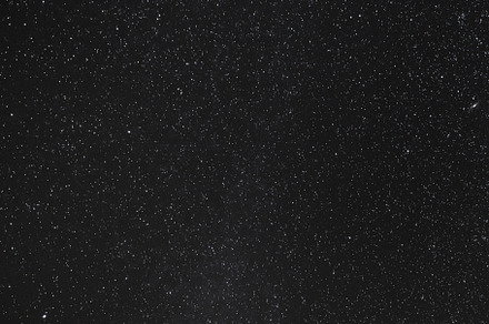 Close up of bright stars on blue sky at night. Natural universe, a Background Photo by Tampatra