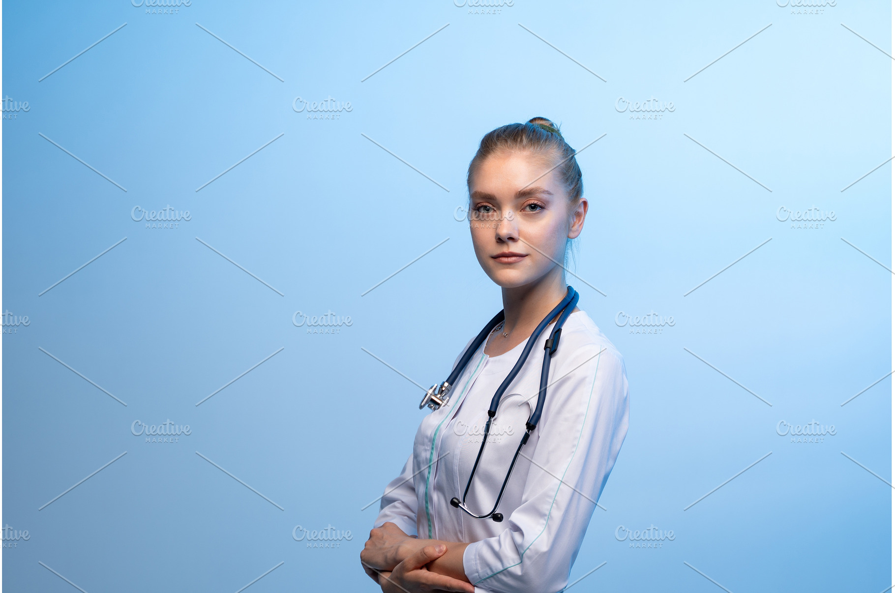 Female doctor wearing white coat and, a Health & Medical Photo by volodymyrshtun13795