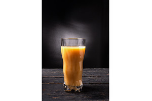 Vibrant Orange Juice Glass with, a Food & Drink Photo by Stockphoto by vzwer