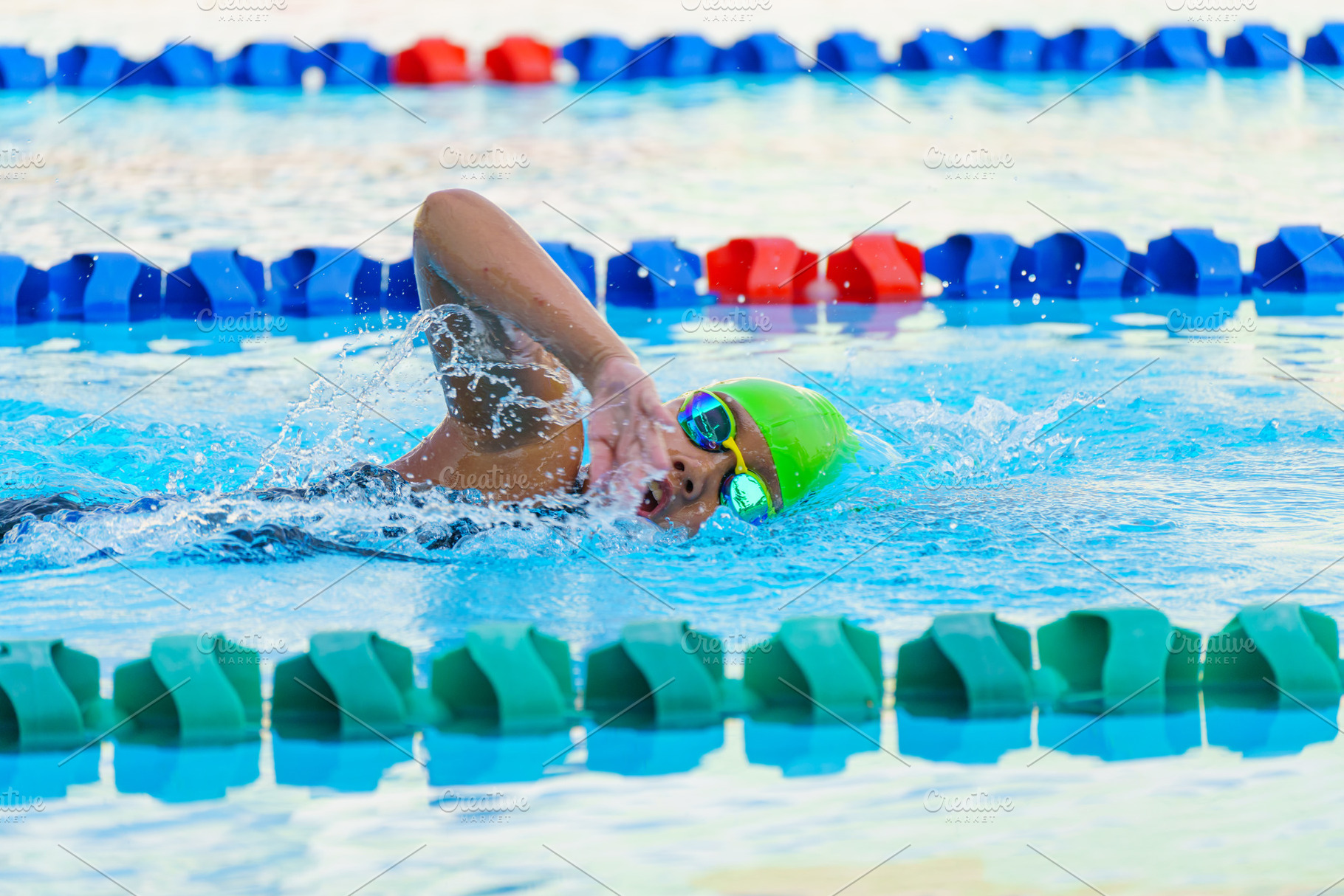 Swimmer child swims freestyle swimmi, a Sports & Recreation Photo by Casanowe-studio