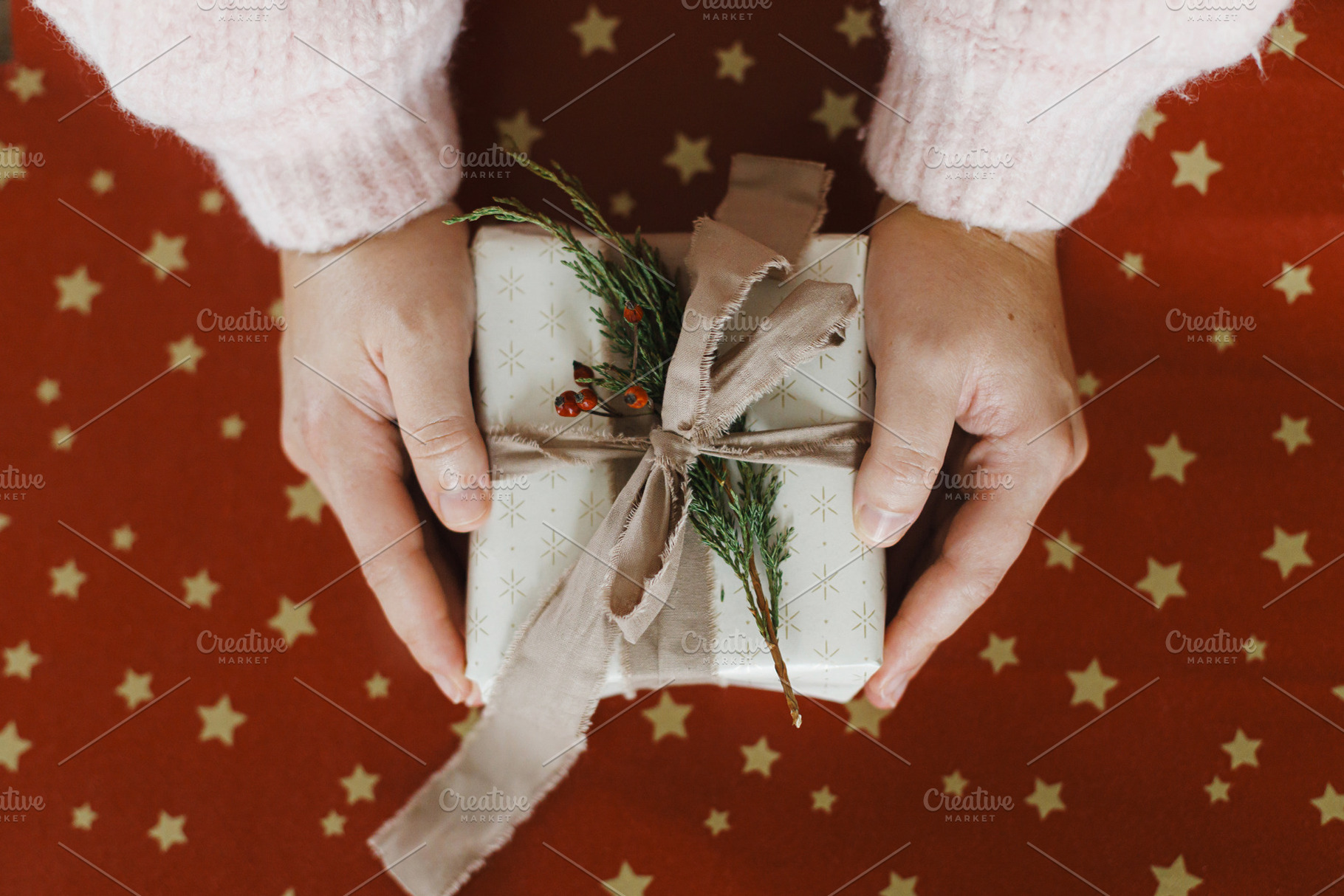 Merry Christmas and Happy Holidays! Hands holding stylish christ, a Holiday Photo by Sonjachni