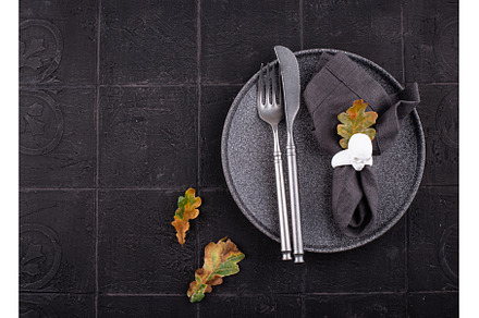 Autumn table setting on dark tile, an Abstract Photo by Yulia Furman