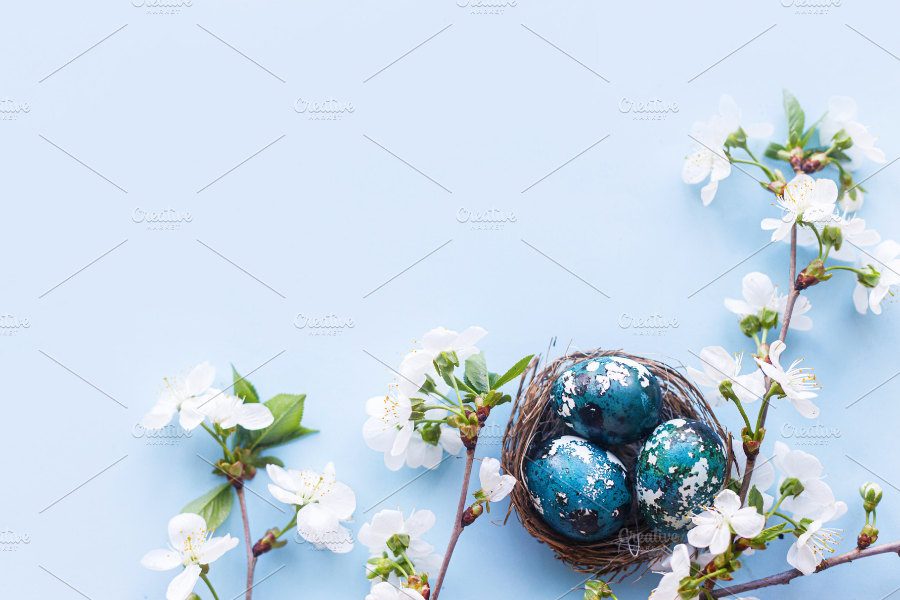 Easter flat lay. Stylish easter eggs in nest and cherry flowers, a Holiday Photo by Sonjachni