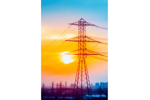 Electricity pylon at sunset with sky, an Industrial Photo by Lermont51