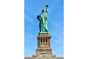 The statue of liberty on liberty island in new york city stock photo, an Architecture Photo by Leonid Andronov