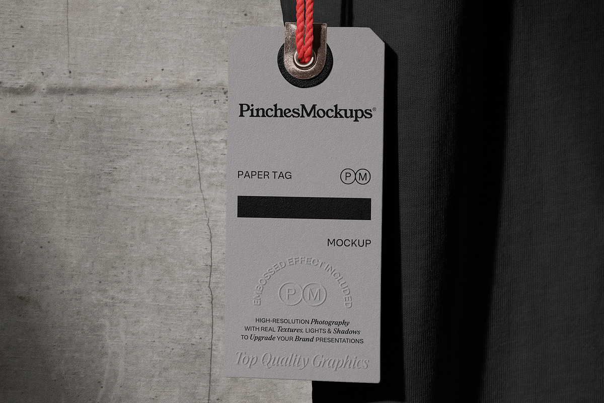 Paper Tag Hangs from T-Shirt Mockup, a Shirt Mockup by PinchesMockups© (Photo 2 of 4)