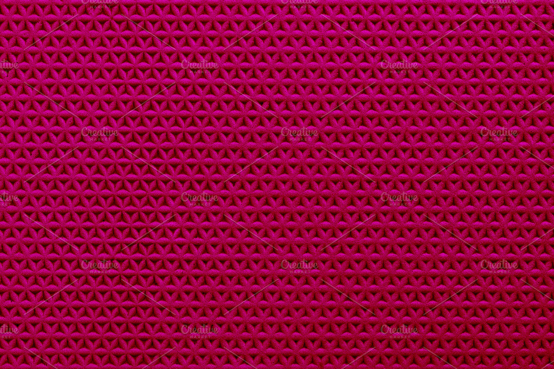 Abstract red surface with repeating triangular pattern, creating, a Background Photo by Ales Munt