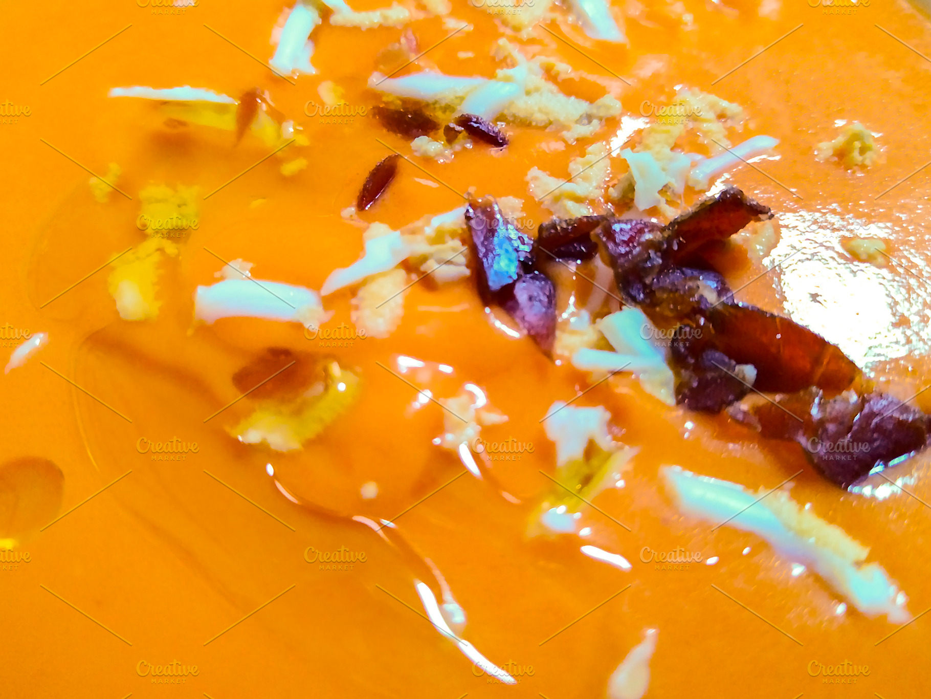 Salmorejo soup with ham and egg on rustic table, a Food & Drink Photo by DanFLCreativo