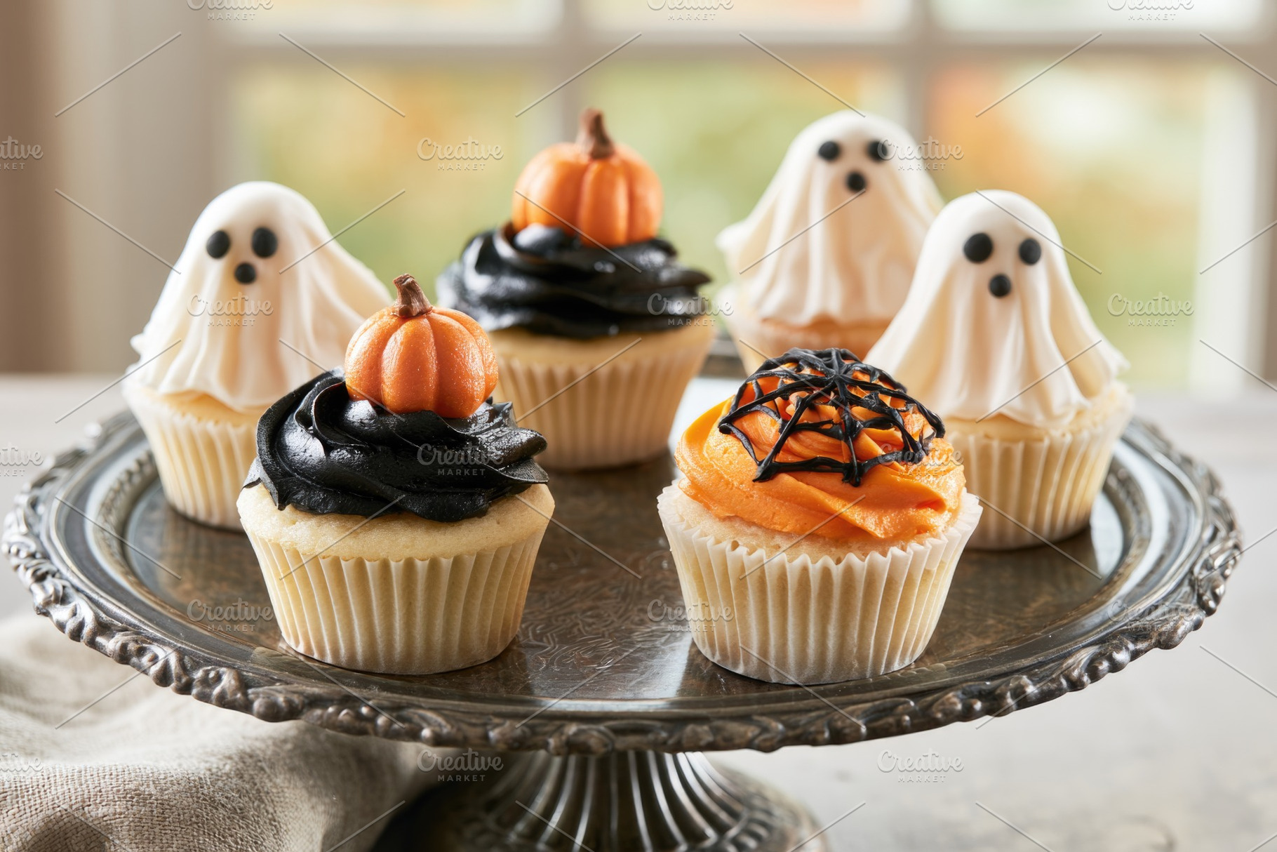 Halloween cupcakes with friendly ghosts and tiny pumpkins, a Food & Drink Photo by José Manuel Gelpi