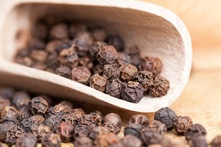 black peas pepper on an old wooden table, a Food & Drink Photo by MyPhotos