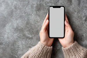 Woman's hands gently hold smartphone, a Photo by Pavel_design