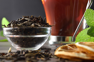 Macro detail of bowl with black tea leaves infusion ingredients, a Food & Drink Photo by Davizro's Market