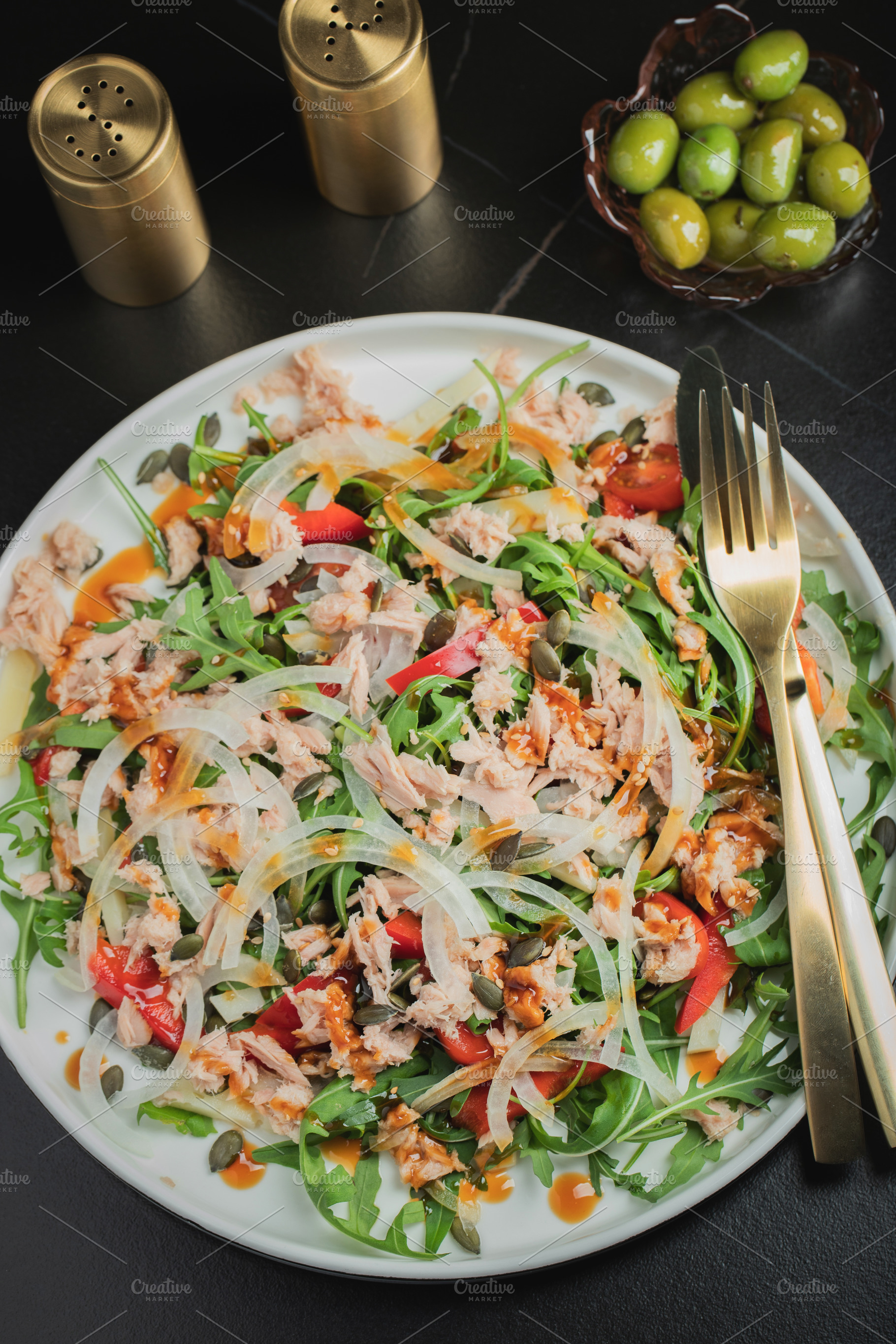 Fresh Tuna Salad with Onions and Cherry Tomatoes. Italian Mediterranean Cuisine, a Food & Drink Photo by Budarinphoto