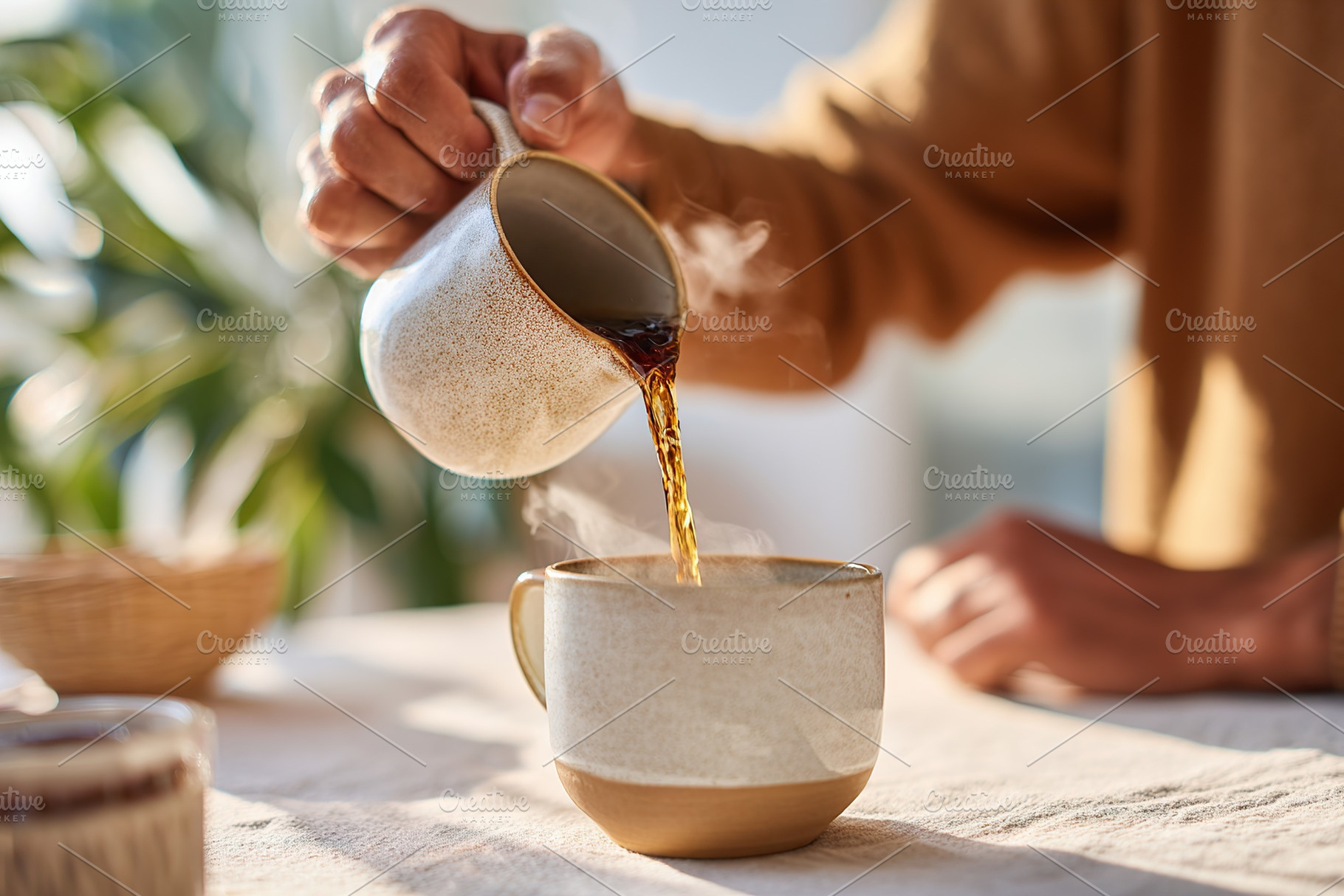 Morning ritual of a person slowly pouring hot coffee into a cup at home, a Food & Drink Photo by AlyaAnd