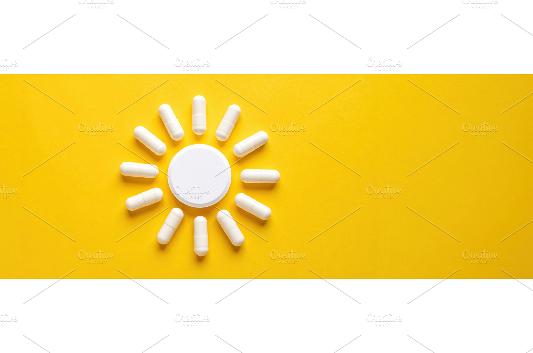 Vitamin D supplement shaped as a sun, a Health & Medical Photo by Igor Tichonow