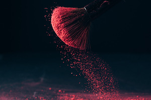 Makeup brush with p powder explosio stock photo containing cosmetic and brush